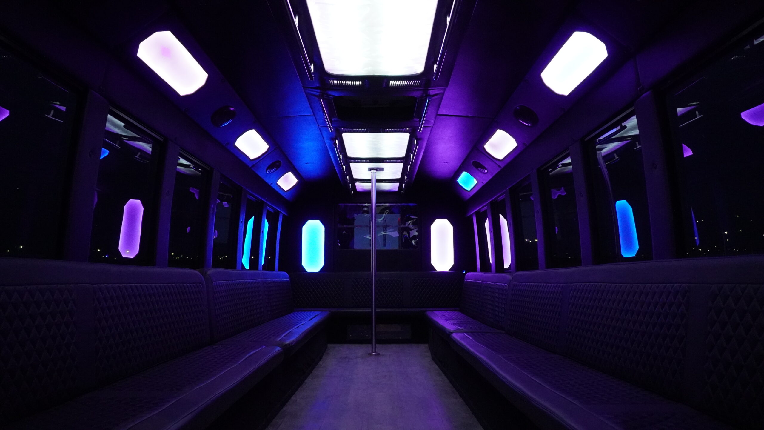 services-01 Luxury interior of a Calgary party bus with LED lighting and premium seating