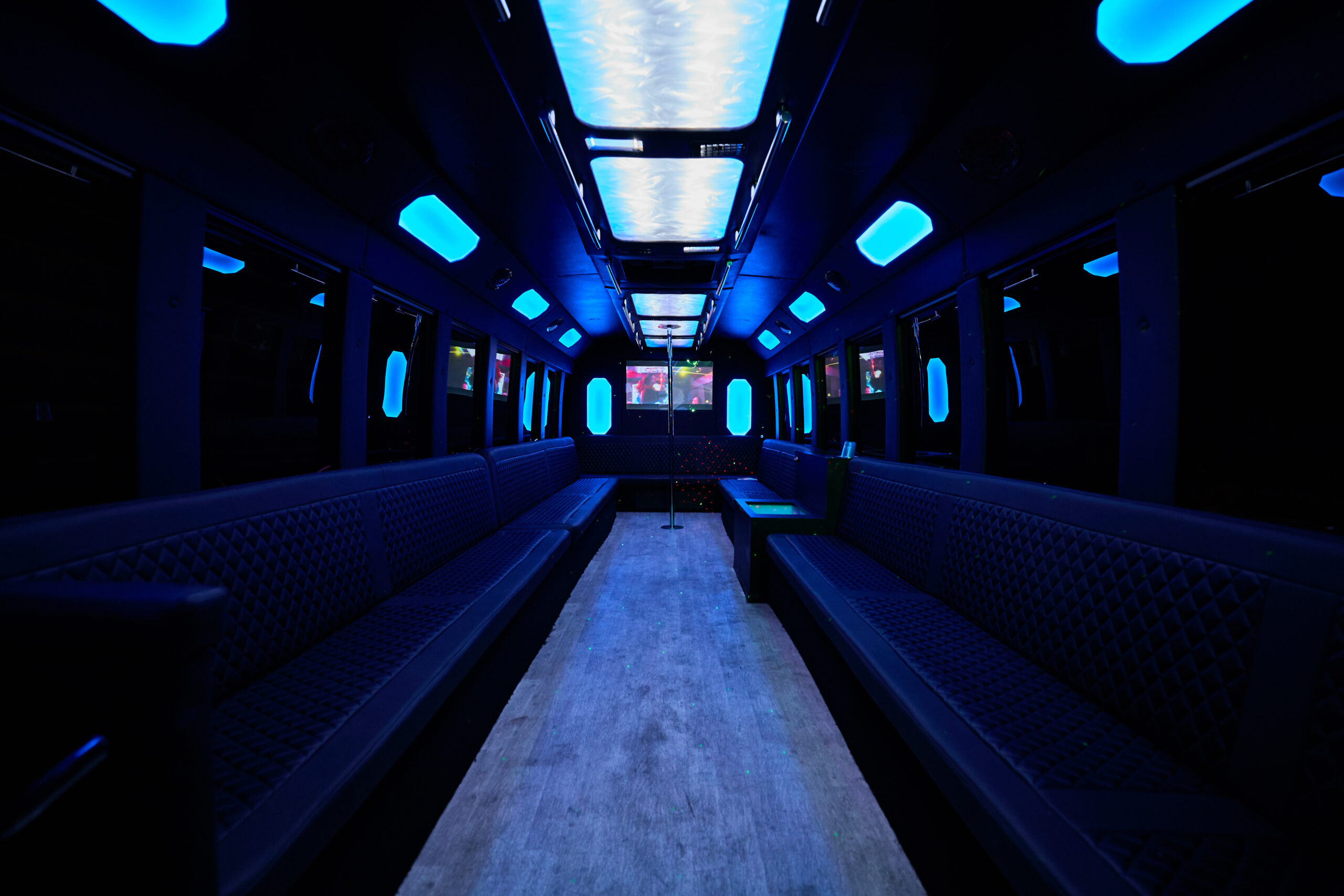 hero-img-01 Luxury interior of a Calgary party bus with LED lighting and premium seating